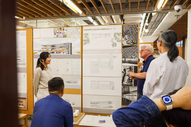 394 A8446 Bachelor of Social Science (Architectural Studies) - Architecture students engaging in group discussions, fostering teamwork and critical thinking in design.