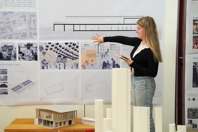 BS Sc Bachelor of Social Science (Architectural Studies) - Well-lit modern studio space where students collaborate on architectural projects, enhancing design skills.