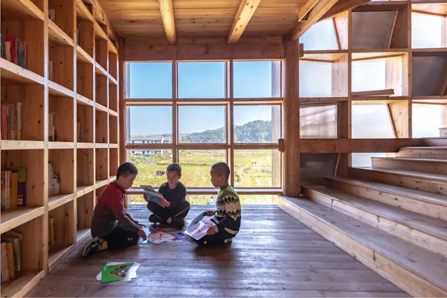 Interior children reading Zhao Sai